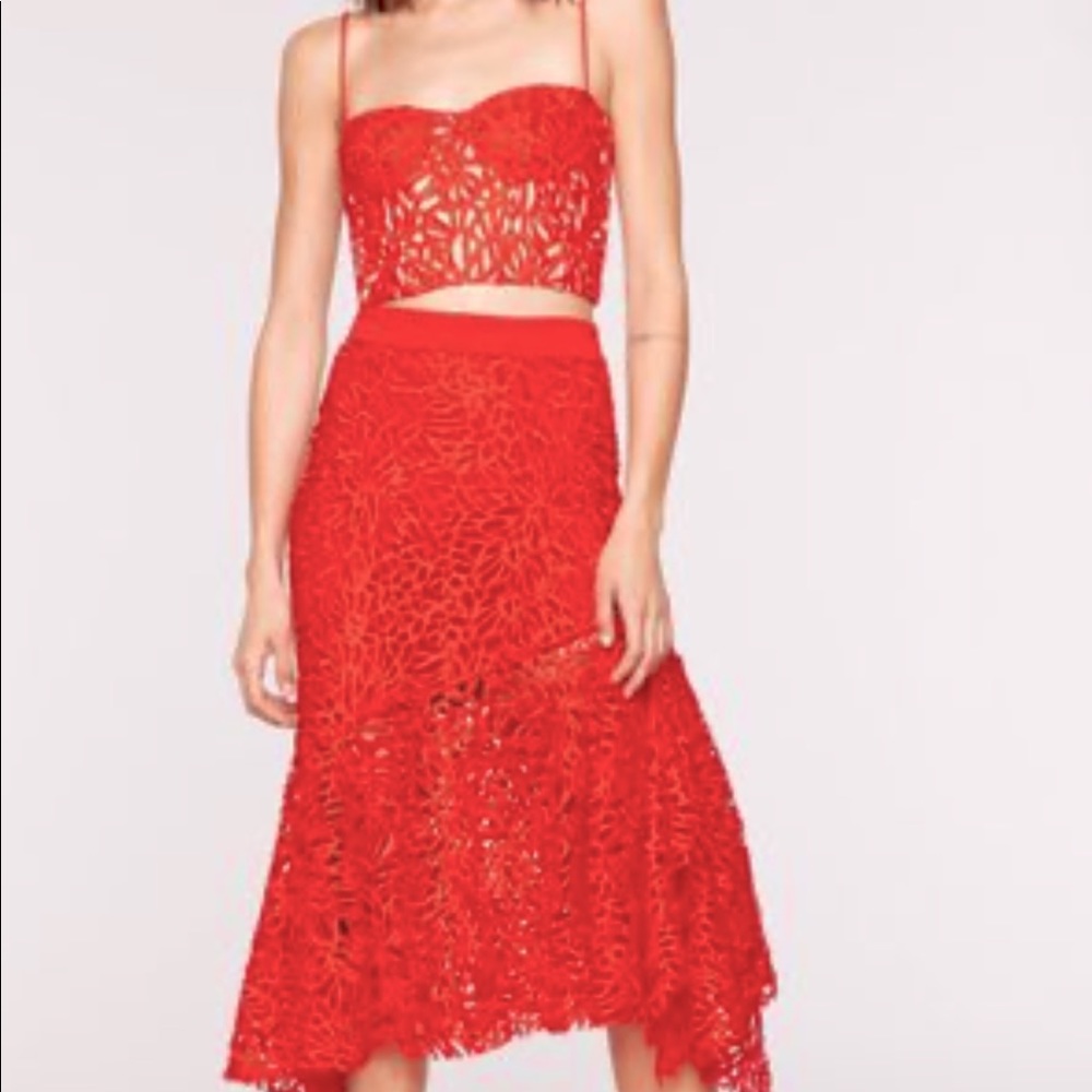 CHARLOTTE ASYMMETRIC GUIPURE LACE SKIRT IN RED